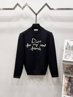 Black crewneck sweater with long sleeves and Dior friends graphic