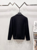 Black crewneck sweater with long sleeves, back view