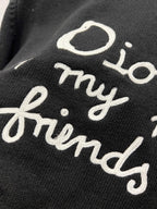 Black sweatshirt close-up of white 'for my real friends' script