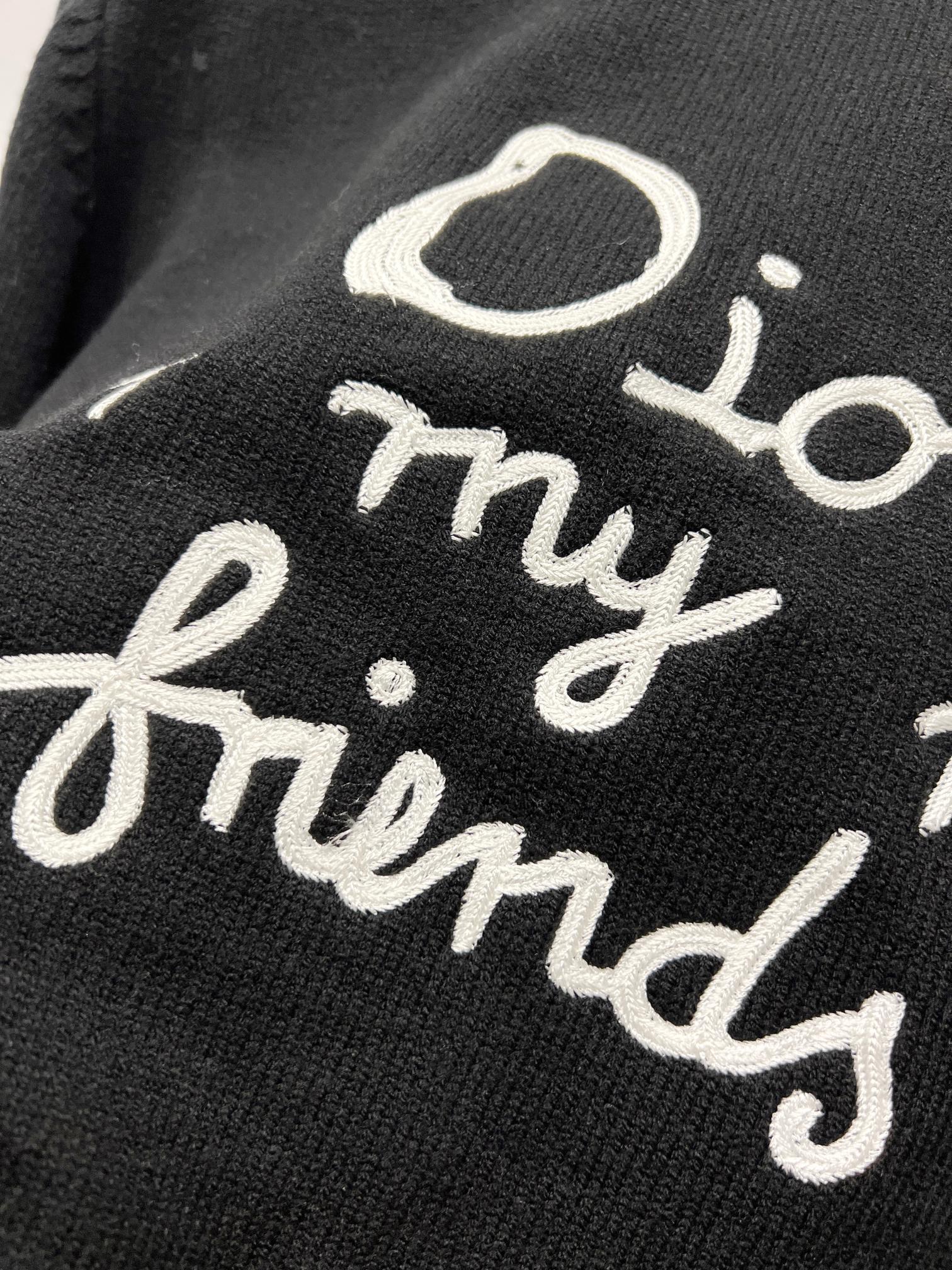 Black sweatshirt close-up of white 'for my real friends' script