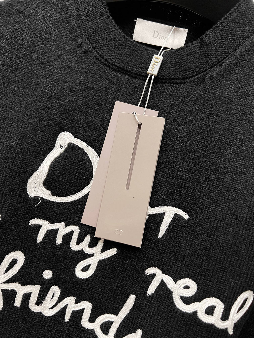 Black crewneck sweater with tag and Dior script “my real friends”
