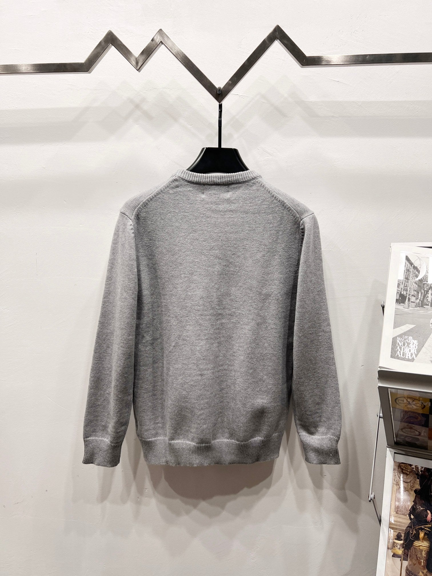 Gray long-sleeve knit sweatshirt with ribbed crew neck and plain back