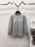 Gray long-sleeve knit sweatshirt with ribbed crew neck and white Gucci logo print