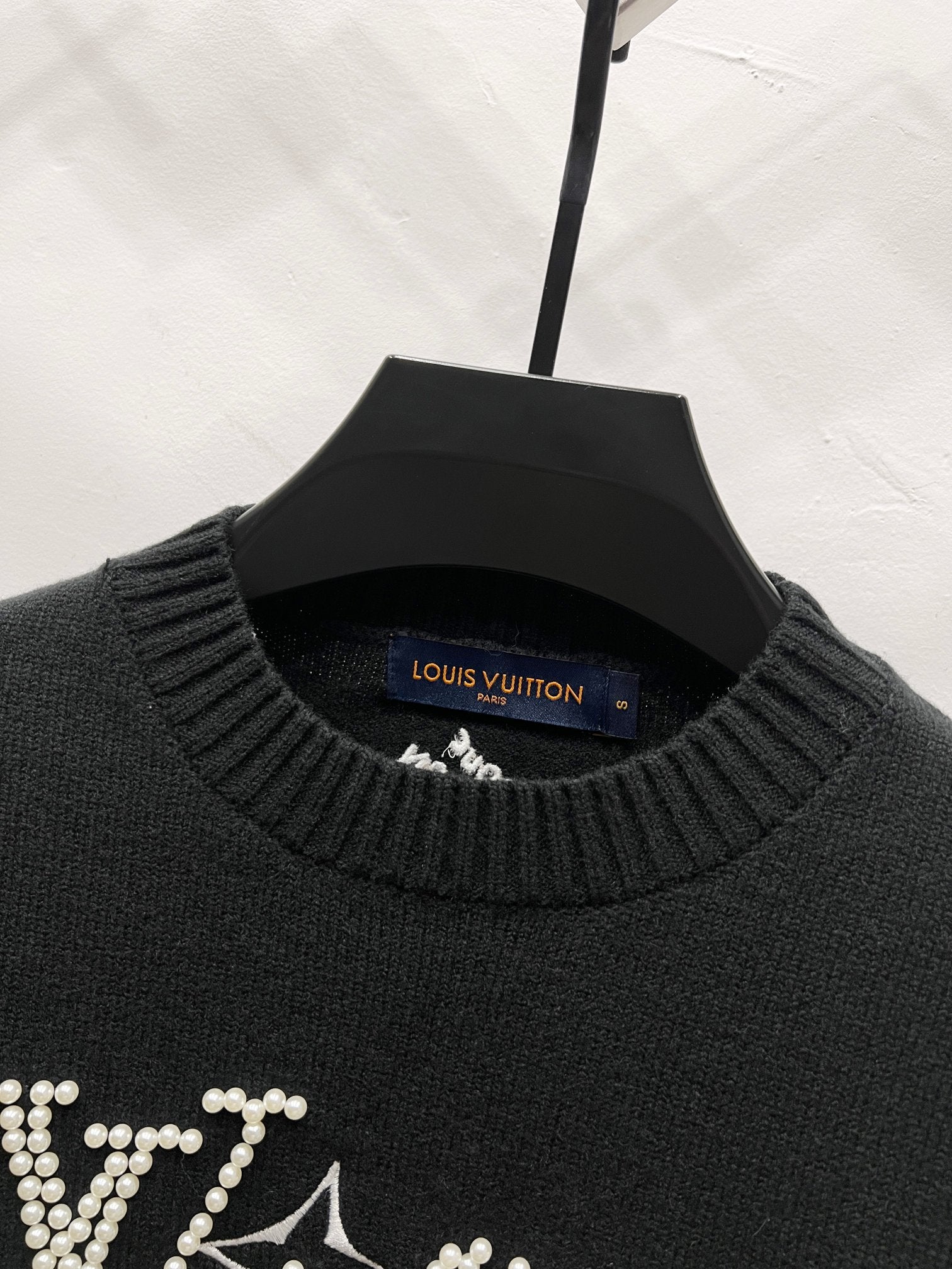 Louis Vuitton black ribbed crewneck sweater with partial rhinestone logo