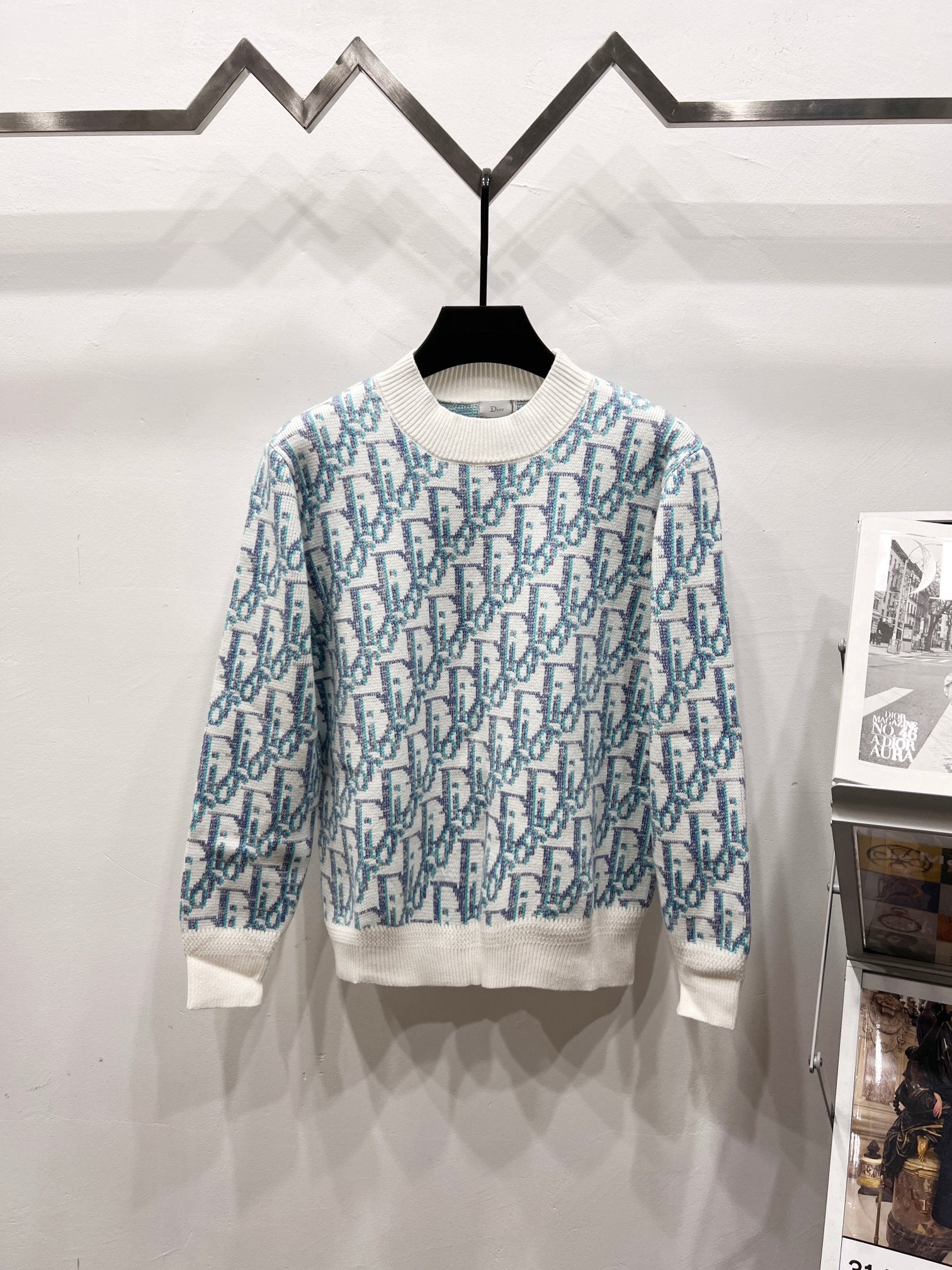 Dior logo knit sweater with crew neck, blue pattern and white ribbed hem