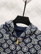 Louis Vuitton navy monogram hoodie collar detail with gold-tone zipper pull