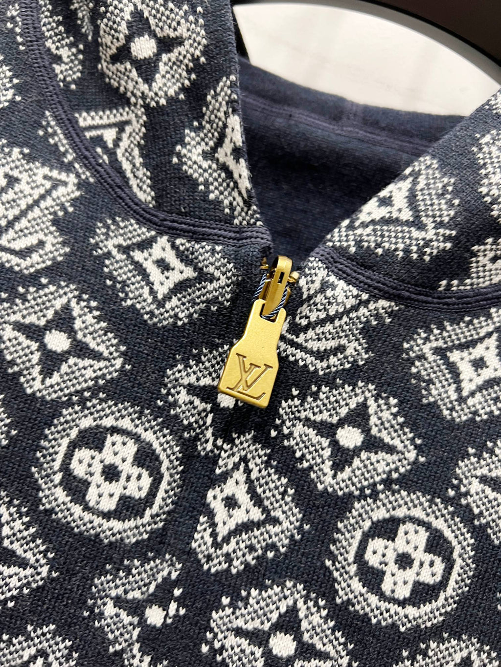 Louis Vuitton navy monogram zip-up hoodie with gold-tone zipper and hood opening