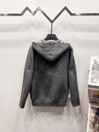 Zip hoodie in dark gray with hood and long sleeves, back view