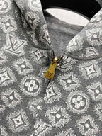 Patterned knit fabric on zip hoodie in dark gray with gold zipper pull