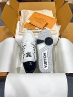Louis Vuitton trainer shoes with navy toe panel and branded outsole tread