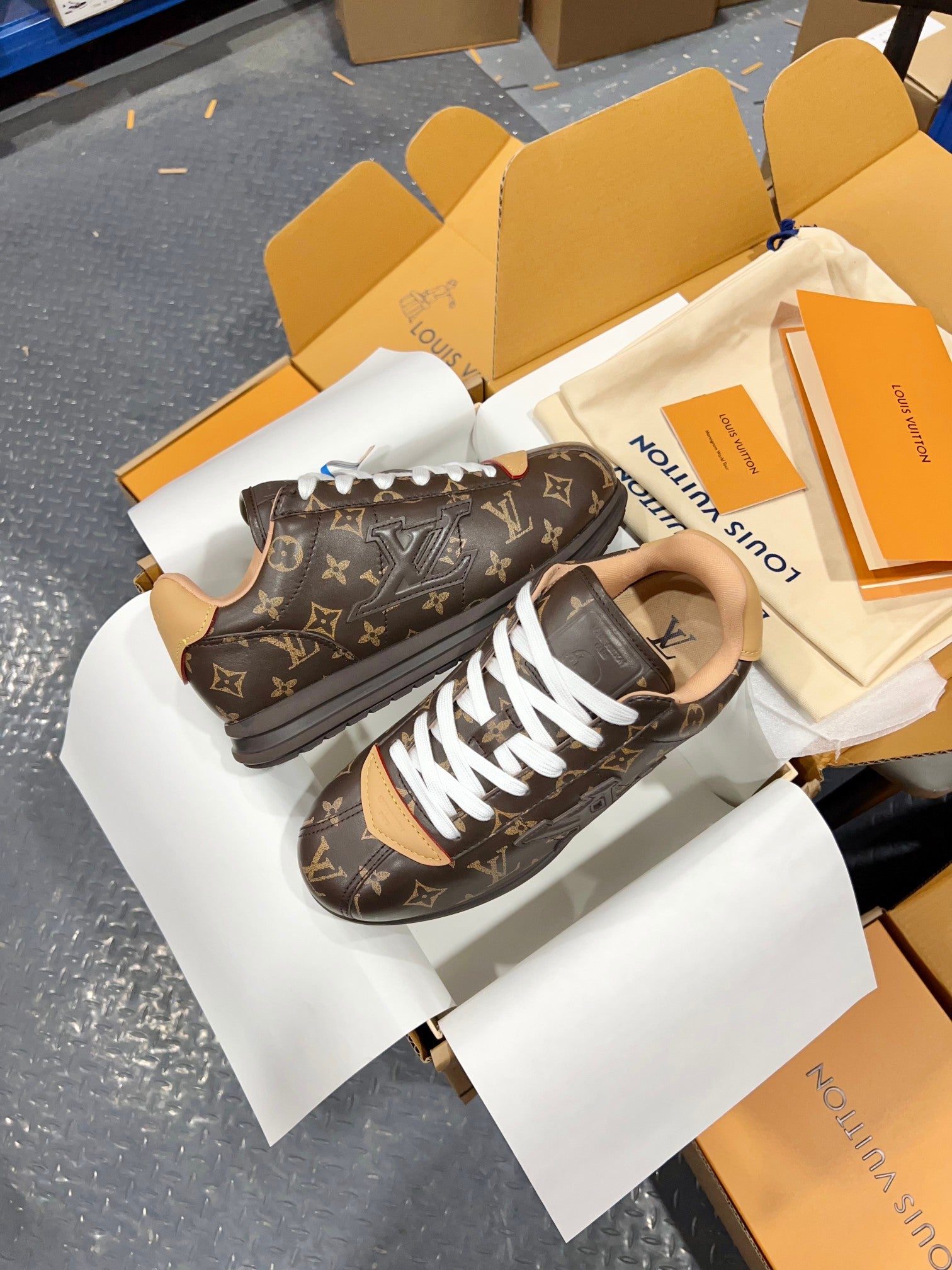 Unisex monogram lace-up sneakers in dark brown with white lace and chunky sole