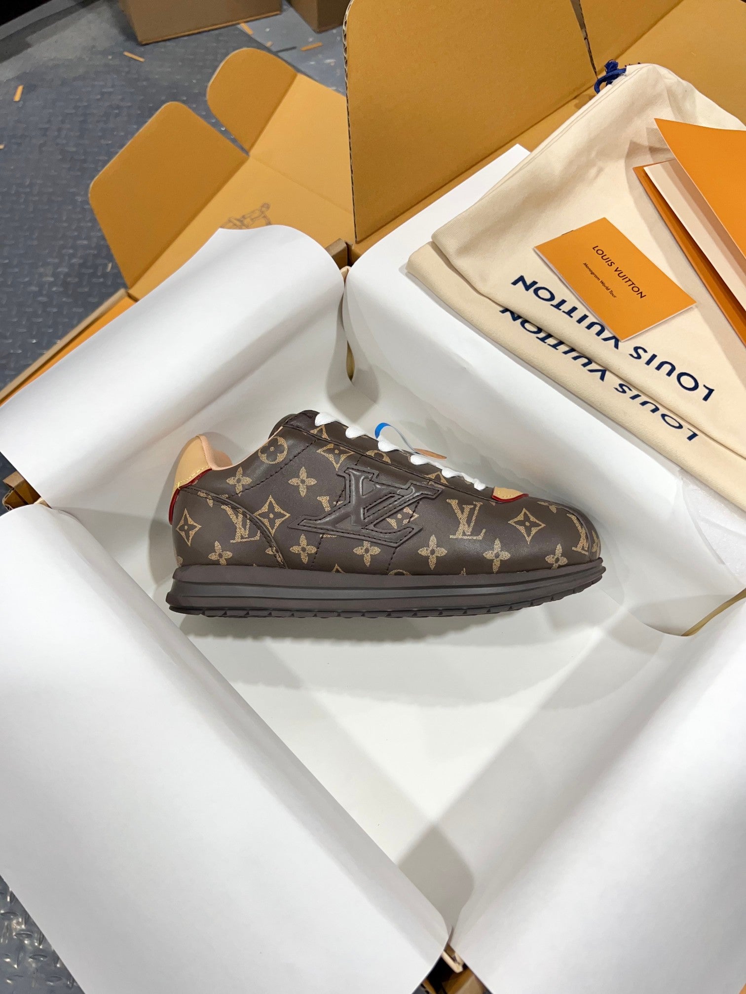 Single unisex monogram sneaker, dark brown with white laces and brown sole