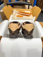 Unisex monogram sneakers from the back, dark brown with tan heel patches