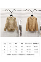 Tan monogram and solid zip-up hoodies on display with size chart