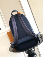 Navy leather backpack with padded back panel and adjustable shoulder straps