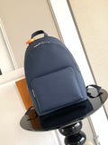 Navy leather backpack with front pocket and adjustable shoulder straps