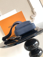 Men's crossbody bag, dark blue pebbled leather, curved flap with adjustable shoulder strap