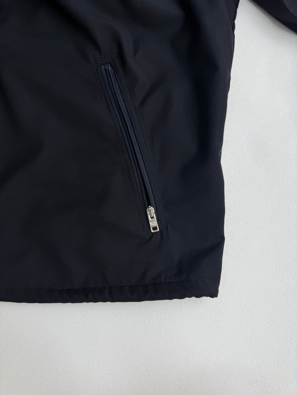 Prada long jacket dark navy with metal front zipper and stitched hem detail