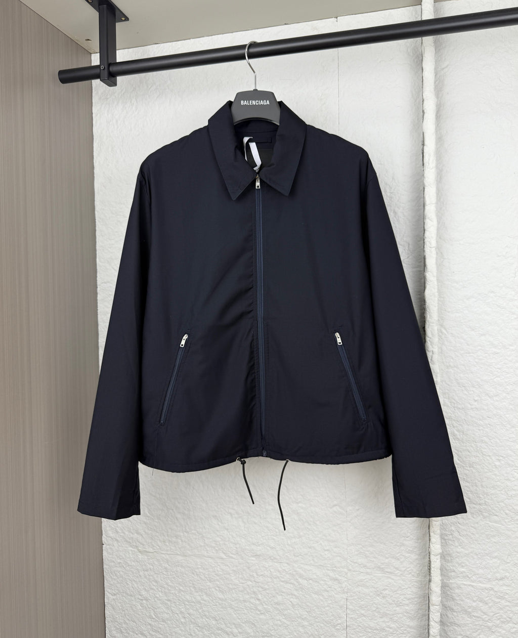 Prada long jacket in dark navy with stand collar, full zipper, drawstring hem, side pockets