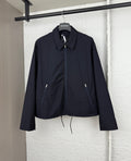 Prada long jacket in dark navy with stand collar, full zipper, drawstring hem, side pockets