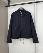 Prada long jacket in dark navy with stand collar, full zipper, drawstring hem, side pockets