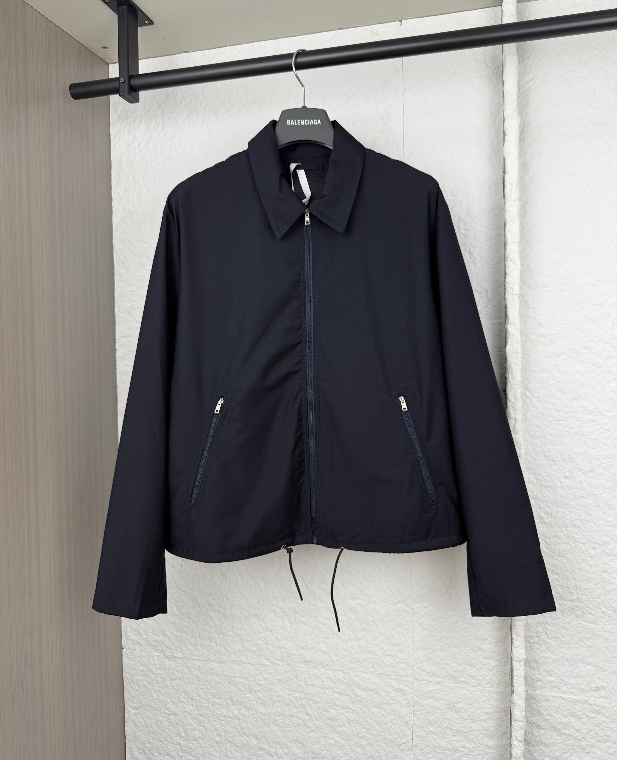 Prada long jacket in dark navy with stand collar, full zipper, drawstring hem, side pockets