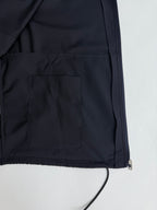 Prada long jacket dark navy with interior pocket panel and seam lines close-up