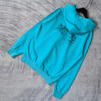 Turquoise zip-up hoodie with hood and Balenciaga logo across back, side view
