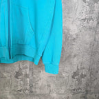 Balenciaga turquoise hoodie with kangaroo pocket and ribbed cuffs