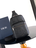 Dior mini backpack bag, black pebbled leather, monogram texture, front zip and strap