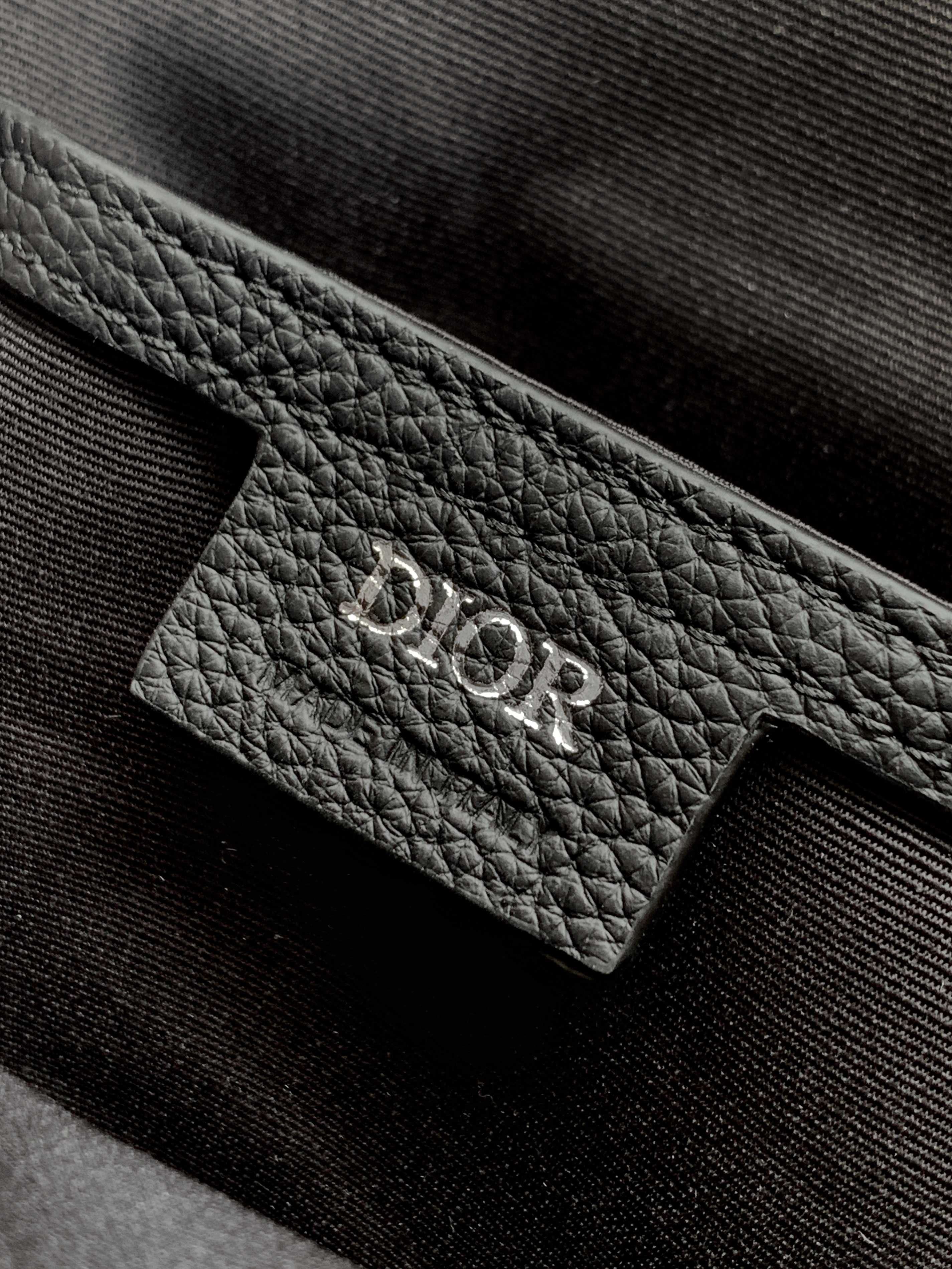 Dior men's leather interior label with Dior logo