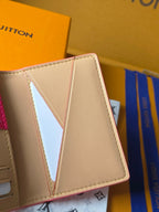 Small wallet bag open view showing beige interior card compartments