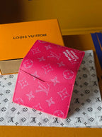 Pink monogram small wallet bag closed with embossed logo pattern