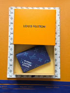 Louis Vuitton monogram card holder, dark blue with patterned logos
