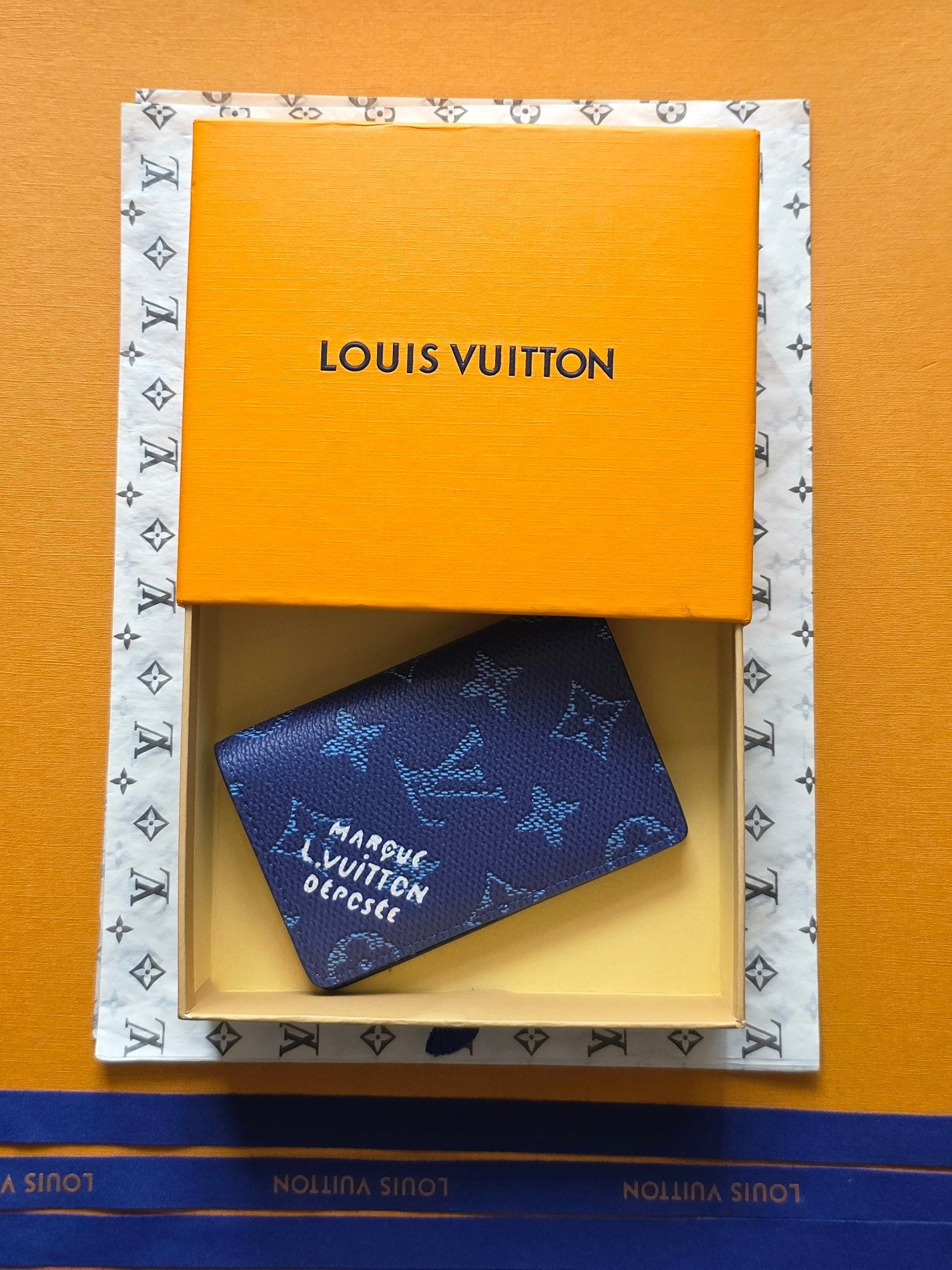 Louis Vuitton monogram card holder, dark blue with patterned logos