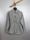 Light gray cotton jacket with button front and chest flap pockets