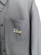 Dior long-sleeve button-up shirt chest pocket close-up, dark gray, Dior logo
