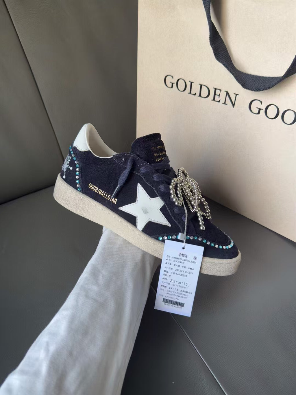 Golden Goose sneakers in dark navy with white star, lace-up, metallic bow detail