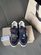 Golden Goose low-top sneakers in dark navy with white star, lace-up, silver chain laces