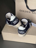 Golden Goose sneakers, dark navy with white heel lining, lace-up with metal chain ornament