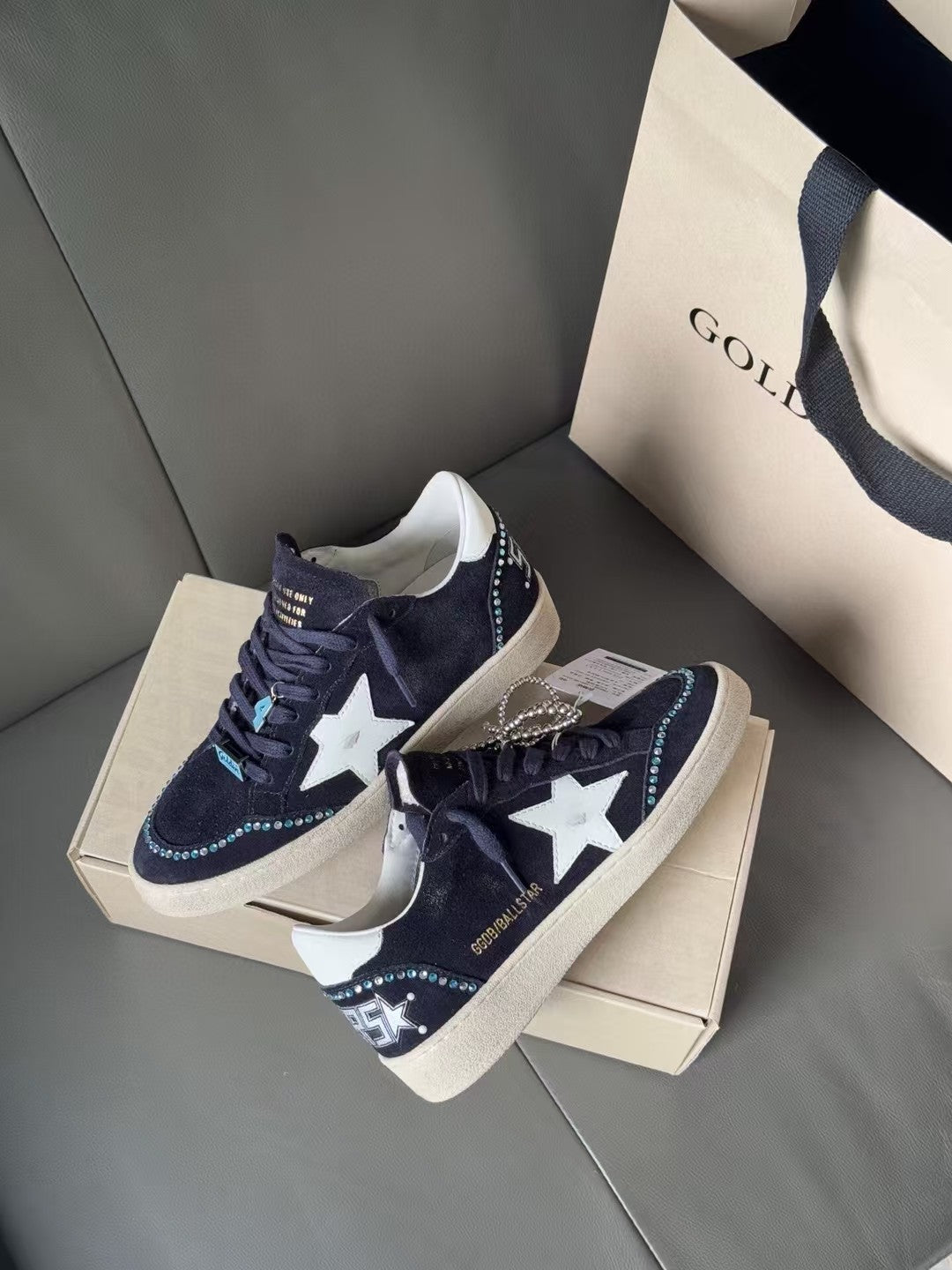 Golden Goose low-top sneakers in dark navy with white star, lace-up, textured side stitching