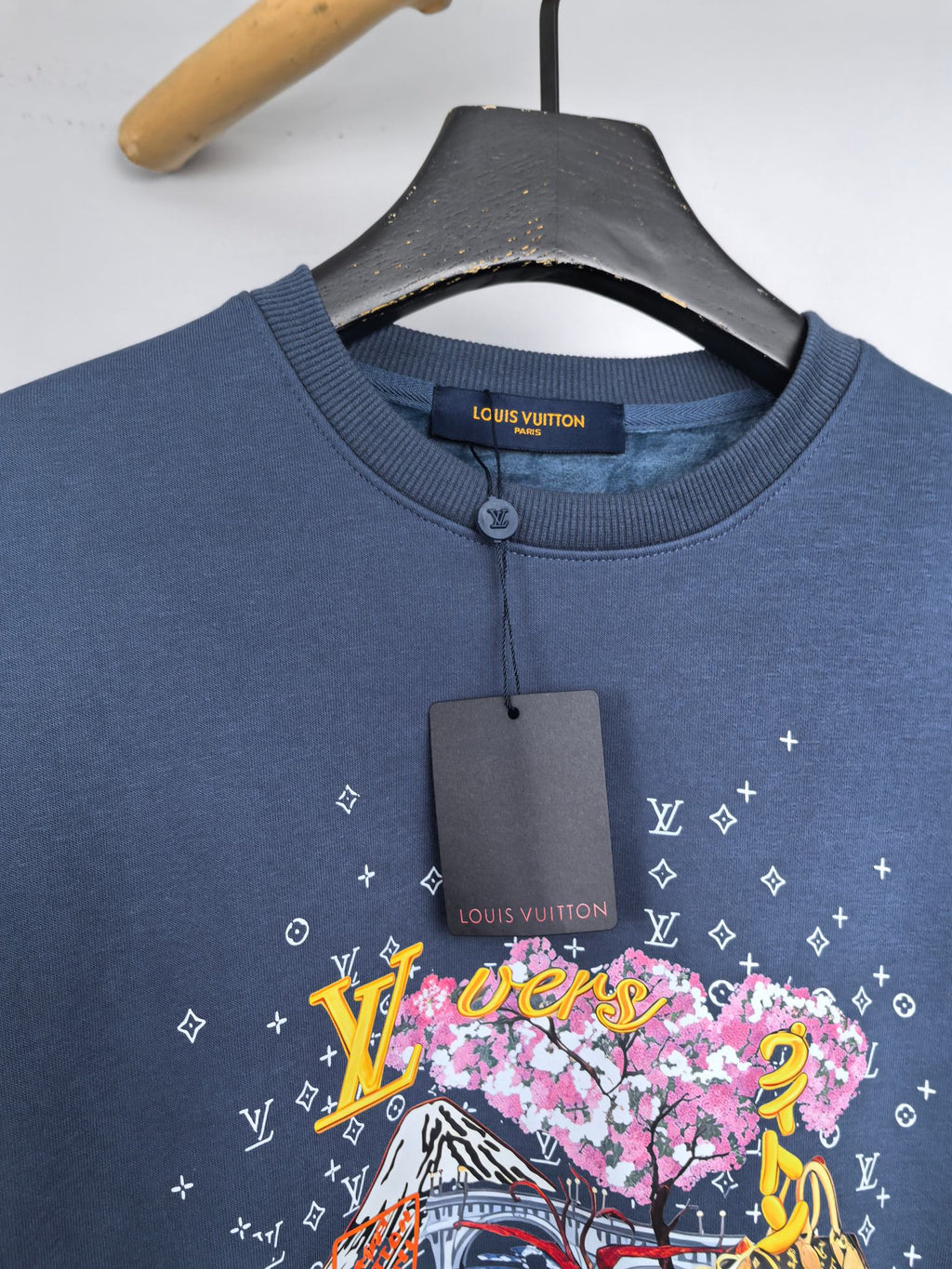 Louis Vuitton dark blue sweatshirt with floral front graphic and crew neckline