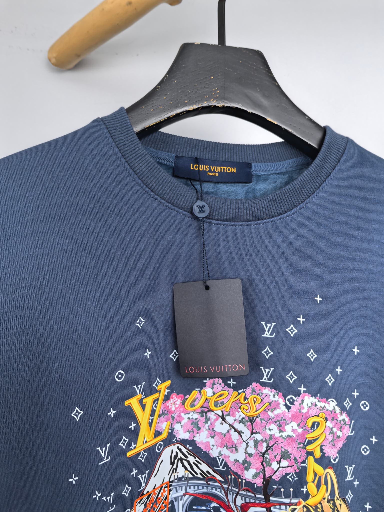 Louis Vuitton dark blue sweatshirt with floral front graphic and crew neckline