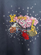 Louis Vuitton dark blue sweatshirt front featuring multicolor flower scene graphic