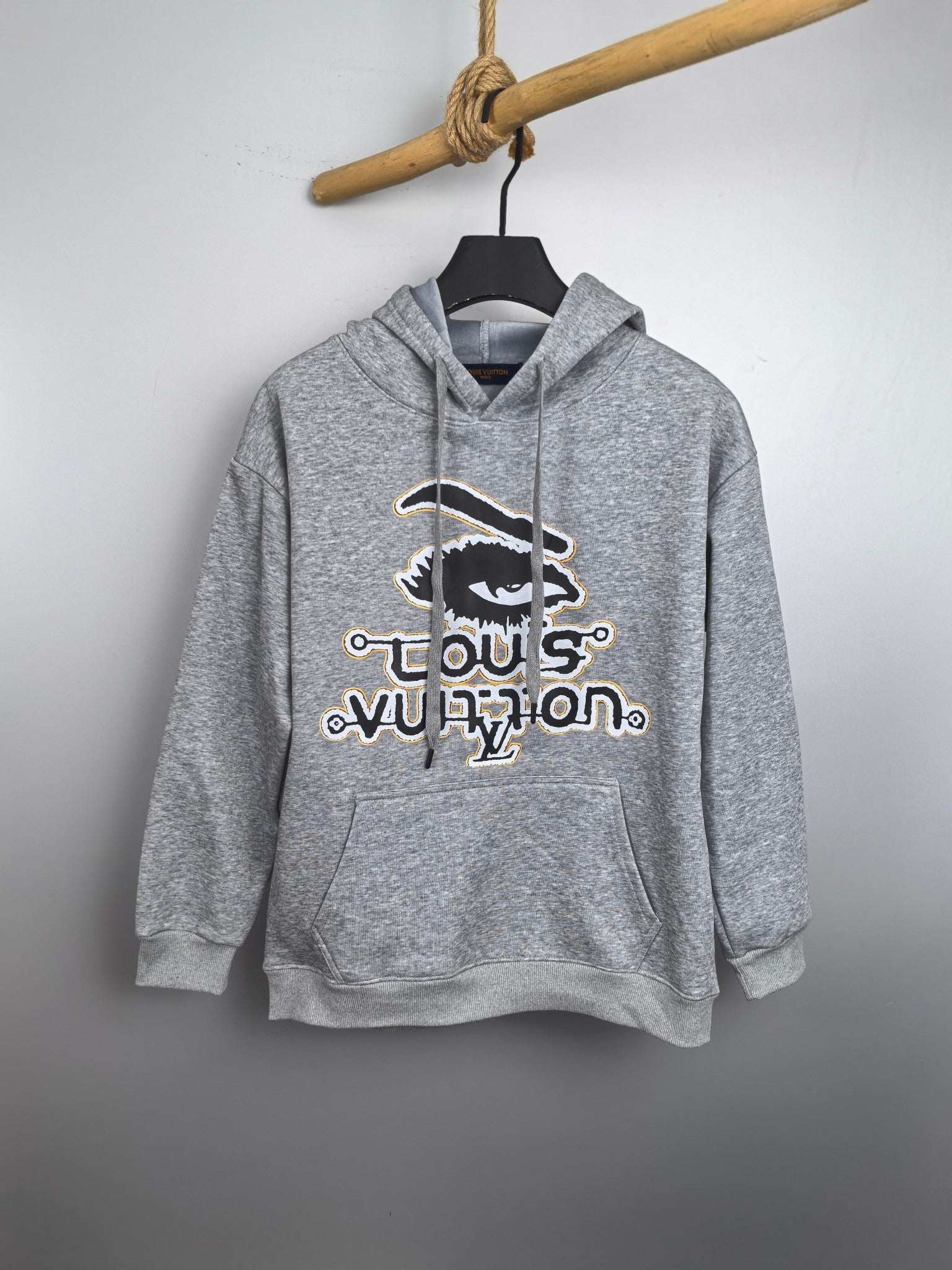 Gray kids hoodie with front hood and large Louis Vuitton graphic print