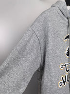 Gray kids hoodie showing side sleeve seam and partial Louis Vuitton graphic