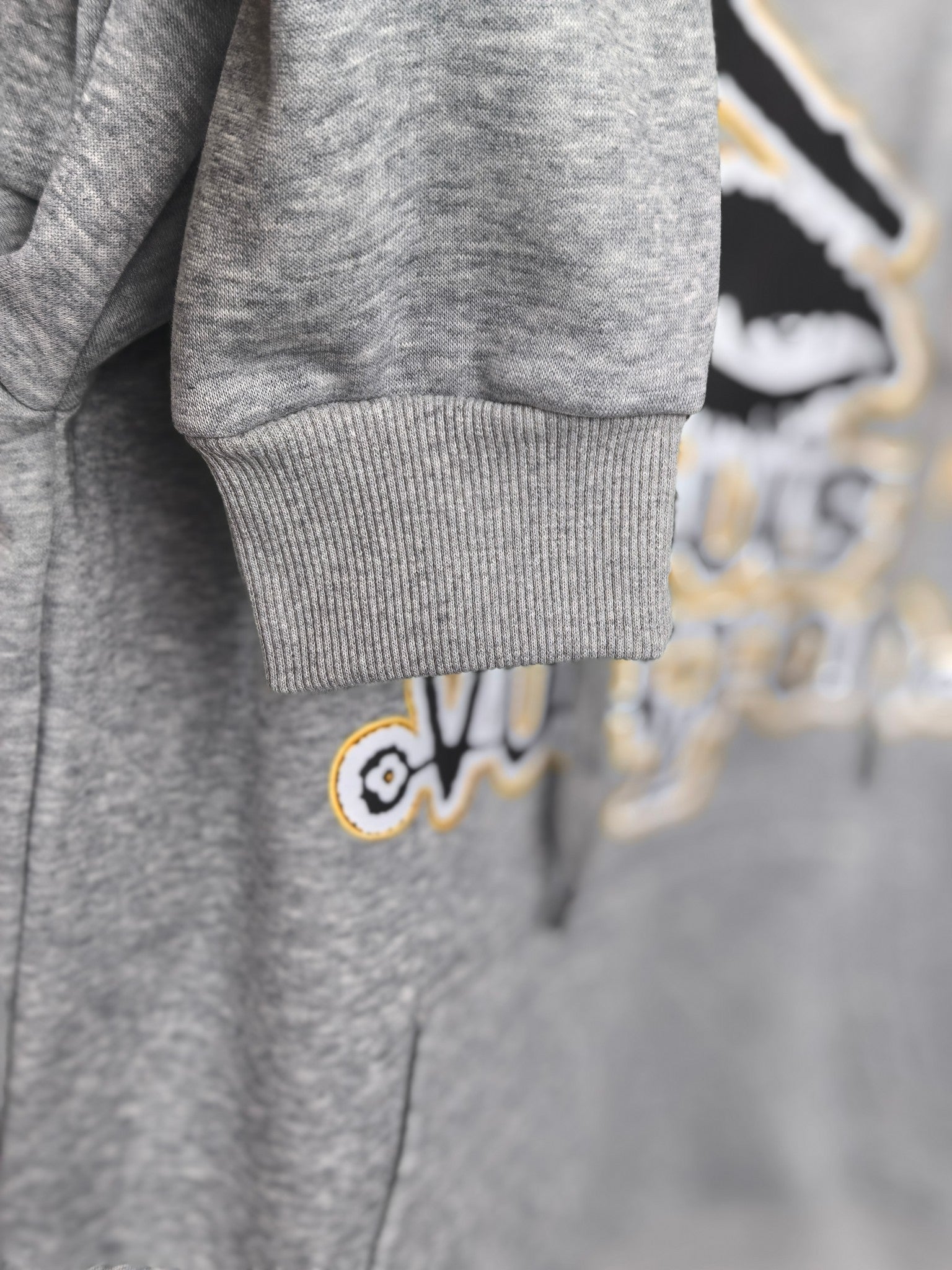 Gray kids hoodie cuff and hem with embroidered-style Louis Vuitton graphic