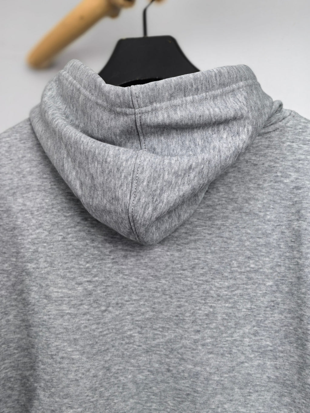 Gray kids hoodie back view with thick hood and stitched seams
