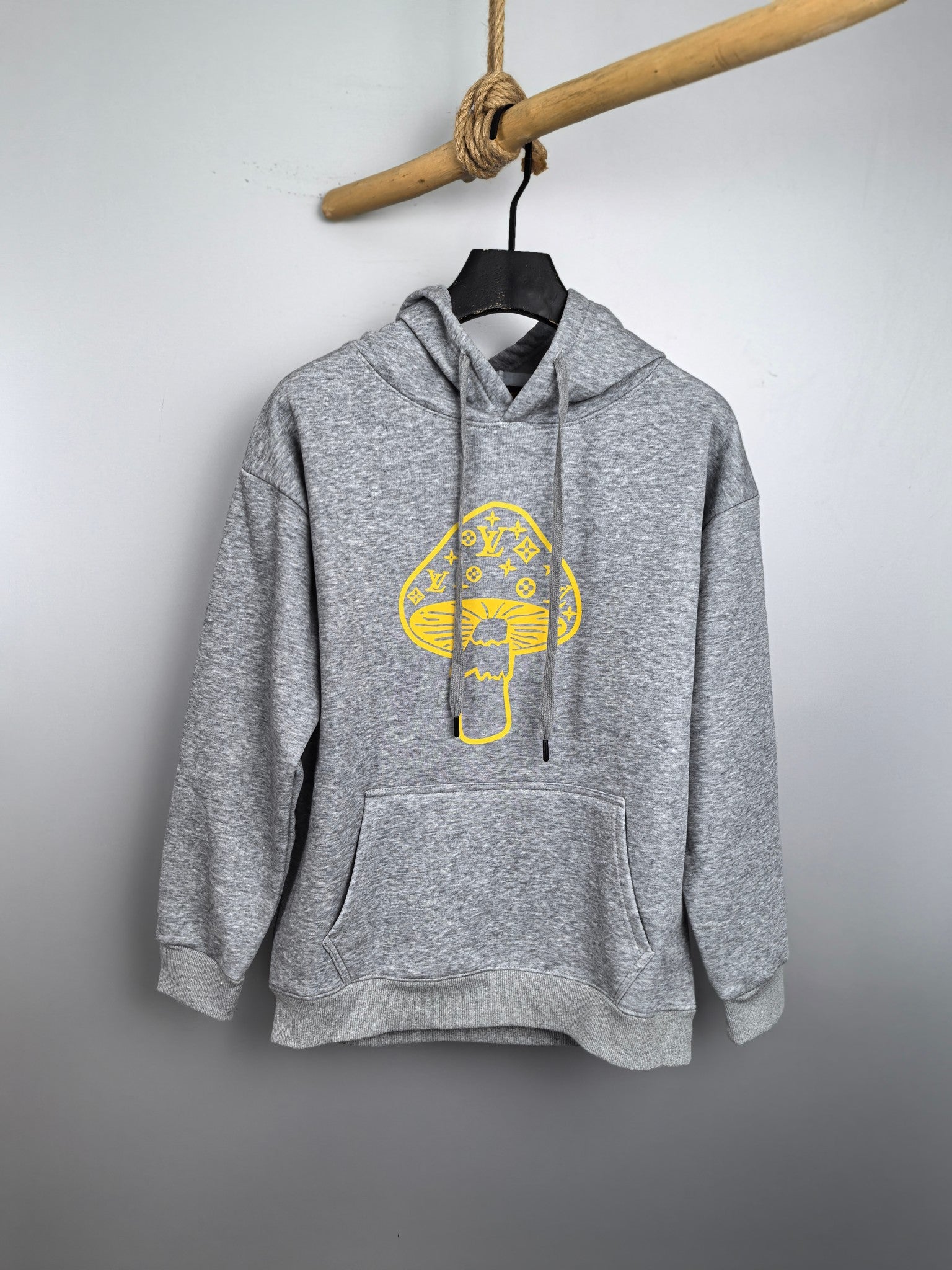 Gray long-sleeve hoodie with yellow LV-style face graphic and front pocket