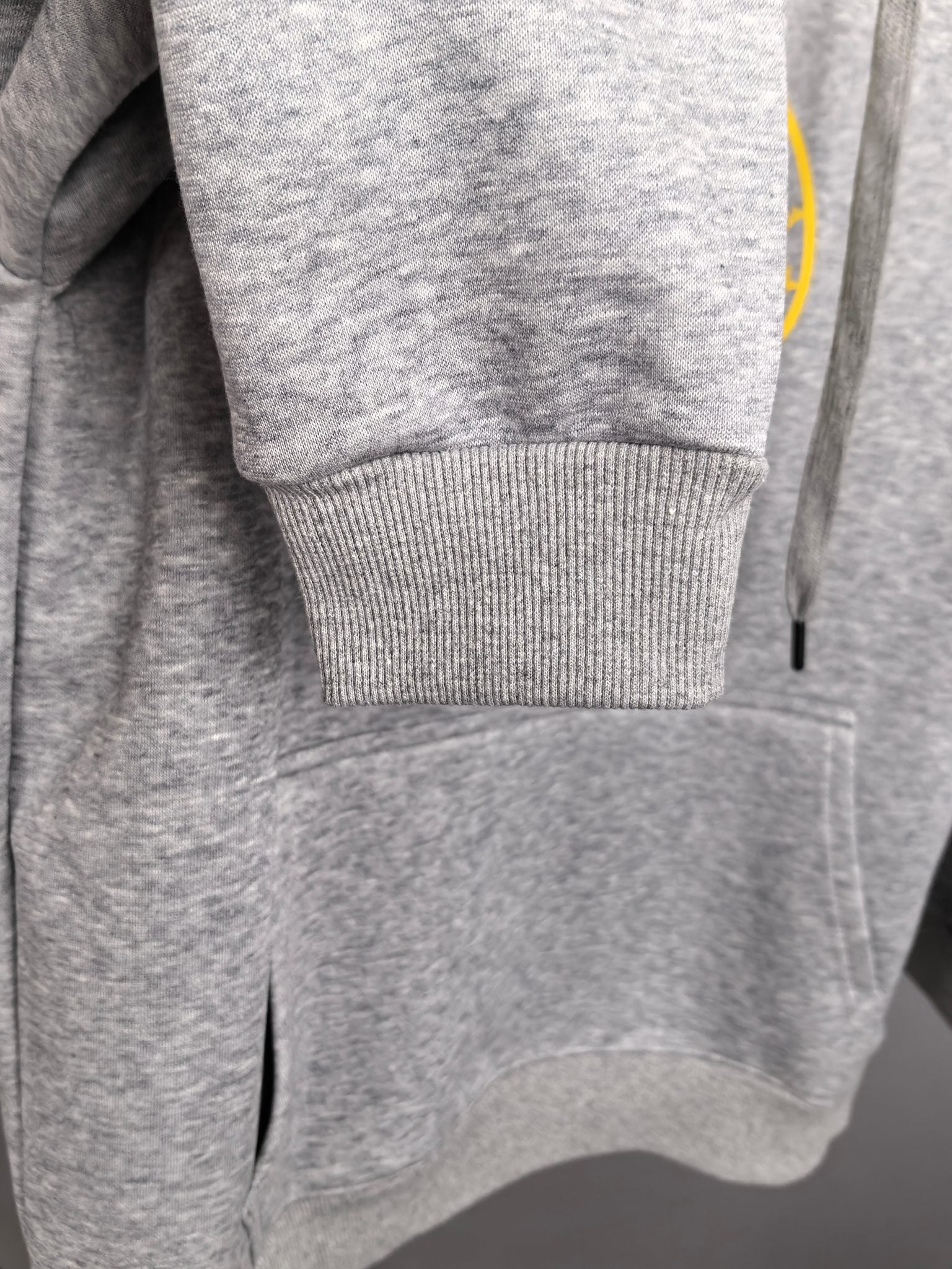 Gray hoodie with ribbed hem and sleeve cuff detail